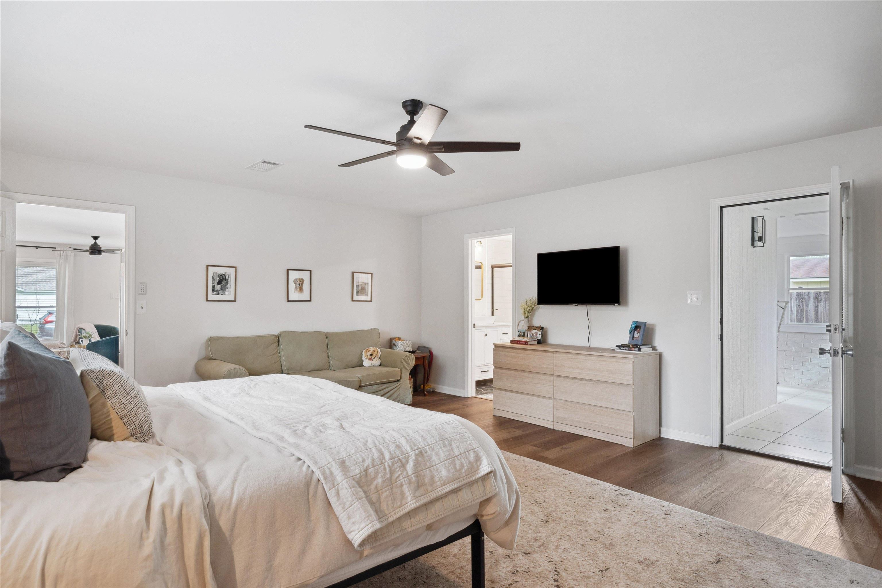 940 Greencliff Road Collierville, TN 38017 - Photo 13 of 23 a bedroom with a bed and a flat screen tv