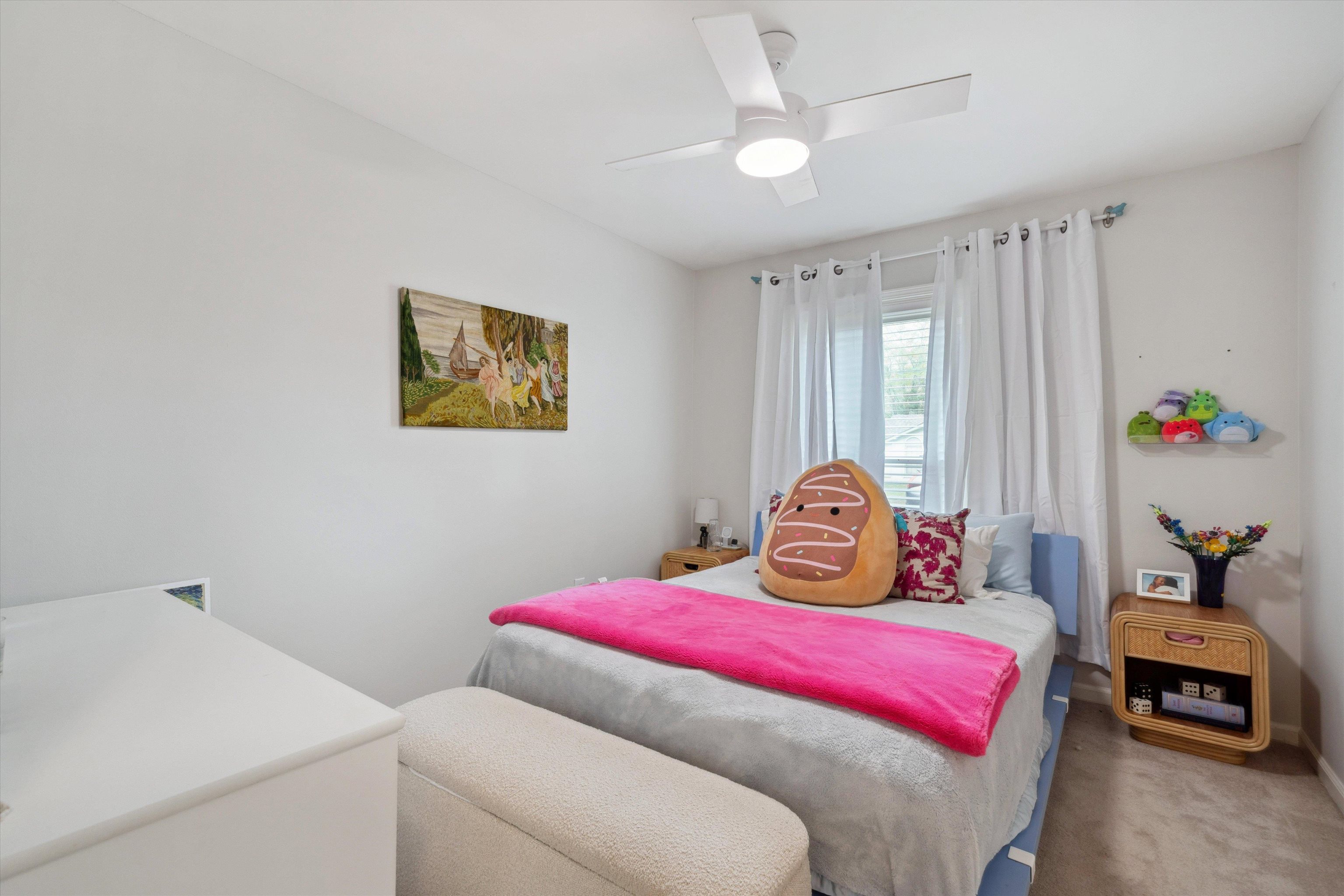 940 Greencliff Road Collierville, TN 38017 - Photo 17 of 23 a bedroom with a bed and a chandelier