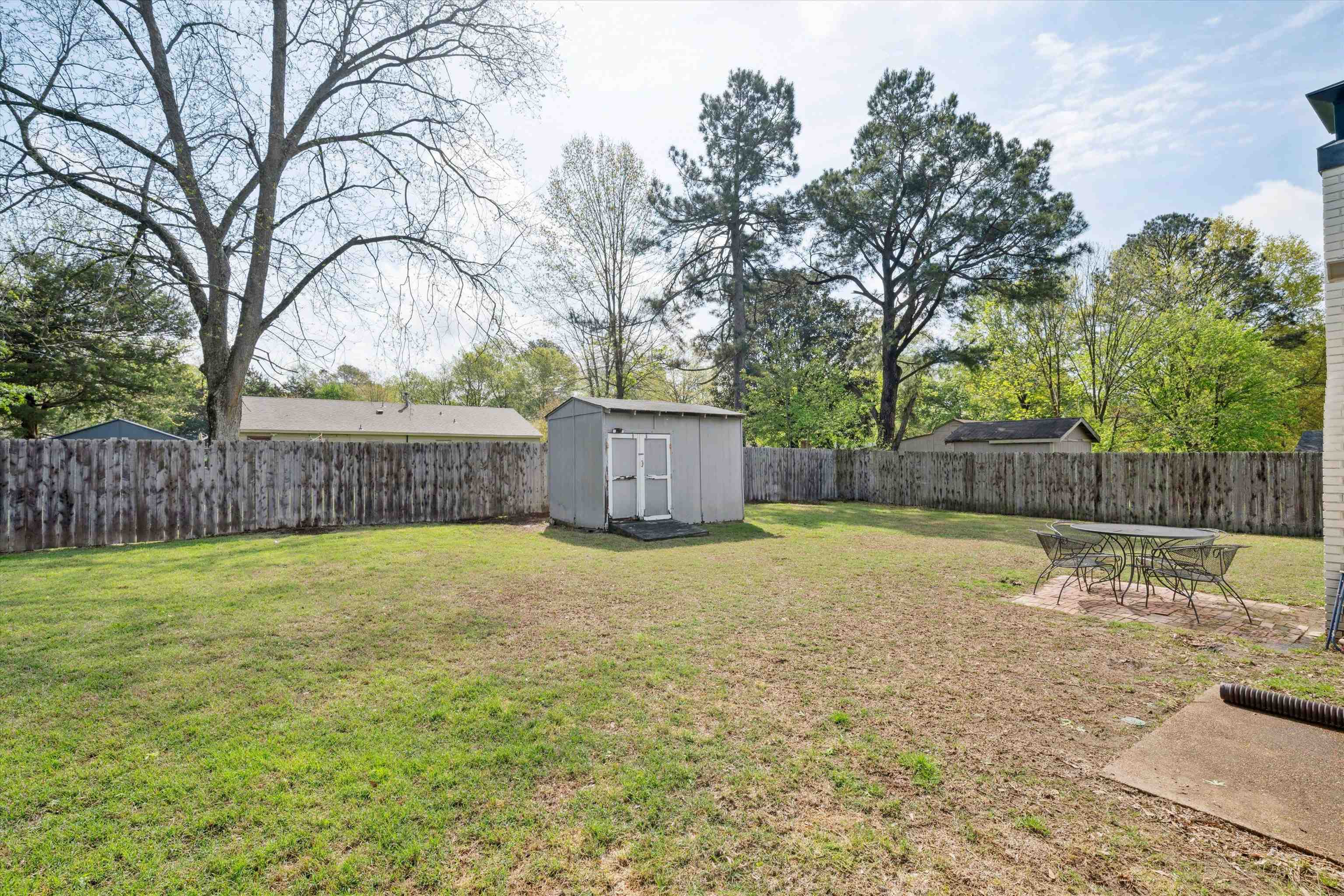 940 Greencliff Road Collierville, TN 38017 - Photo 21 of 23 a swimming pool with wooden fence