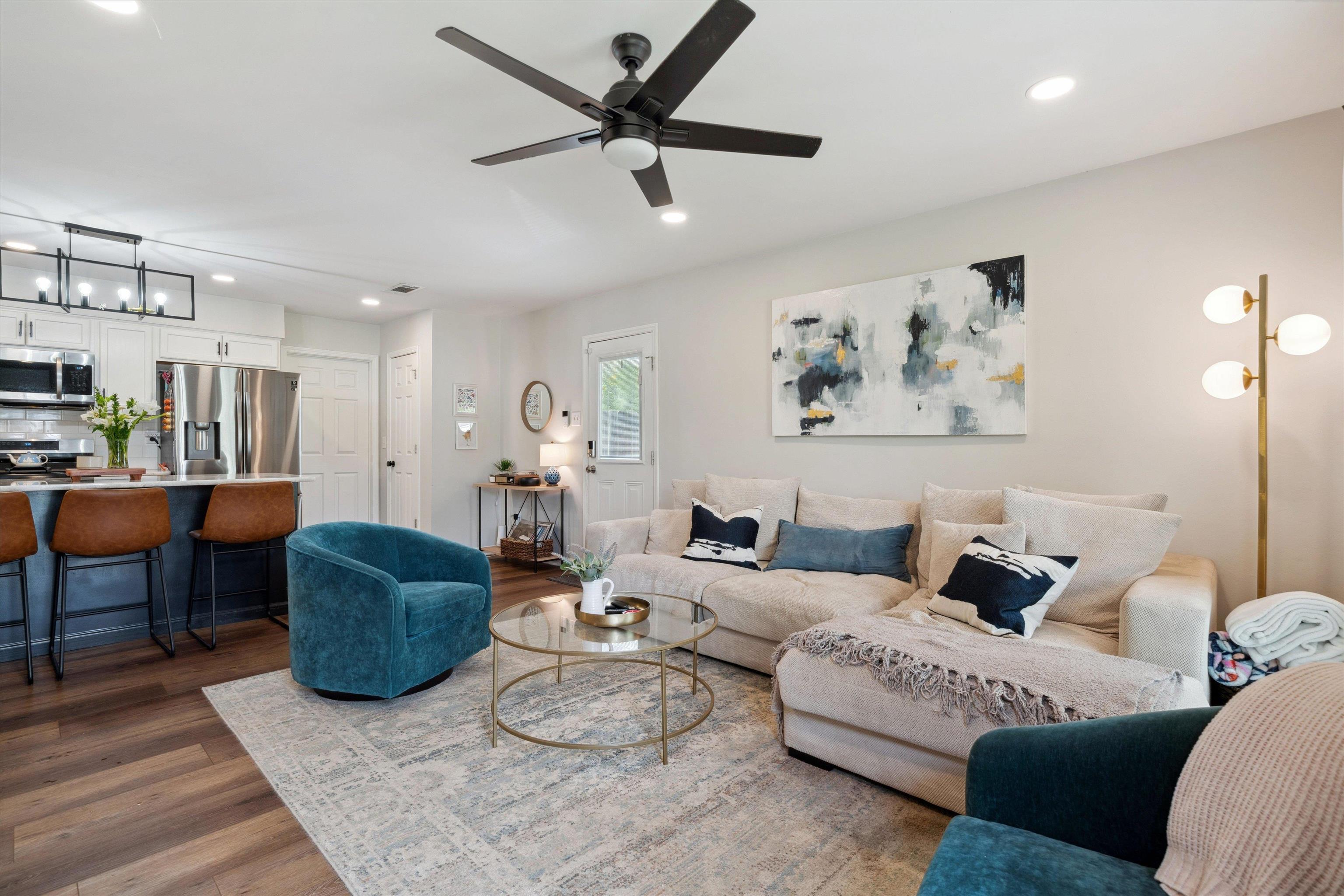 940 Greencliff Road Collierville, TN 38017 - Photo 3 of 23 a living room with furniture a rug and a painting