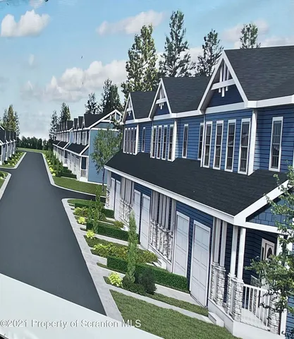 a view of a house with wooden deck