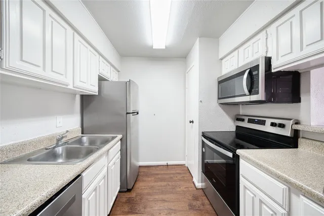 a view of washer and dryer in a utility room