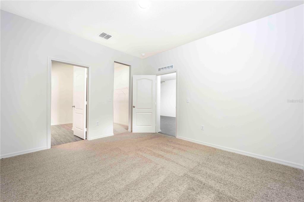 13486 Leaping Water Way Astatula, FL 34705 - Photo 13 of 20 a view of empty room