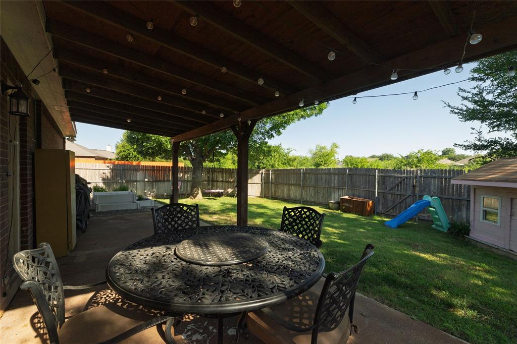 4025 Chisos Rim Trail Fort Worth, TX 76244 - Photo 36 of 40 Covered patio featuring a wood ceiling, recessed lighting, and string lights
