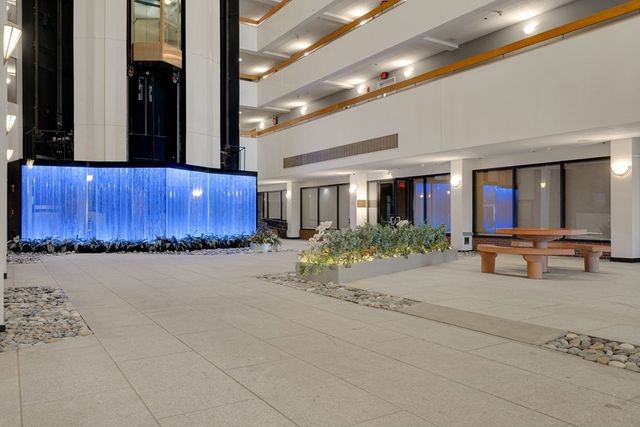 a view of a chairs and table in the patio
