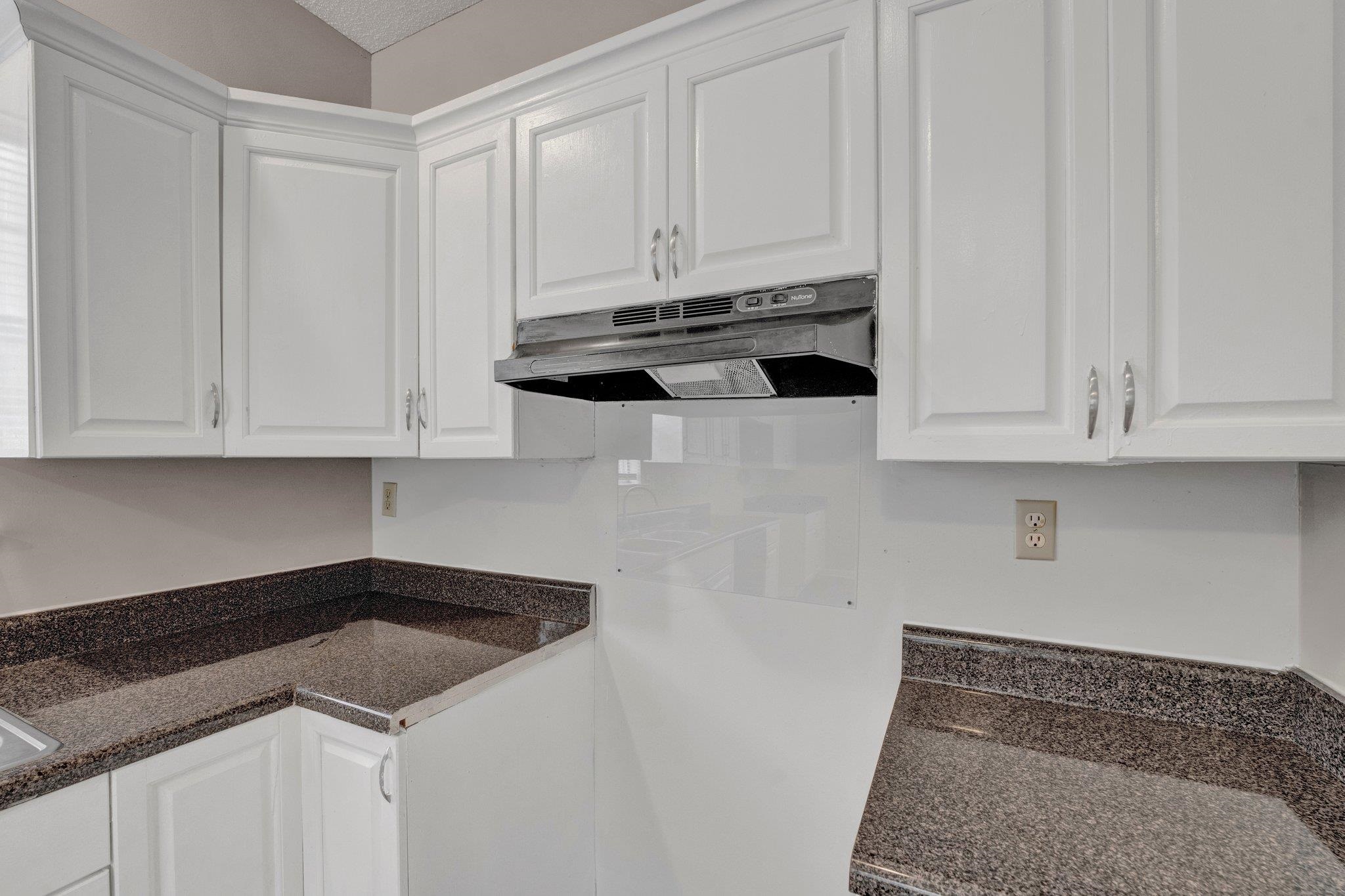 6309 Ragan Farm Drive Memphis, TN 38141 - Photo 15 of 25 Kitchen featuring white cabinetry