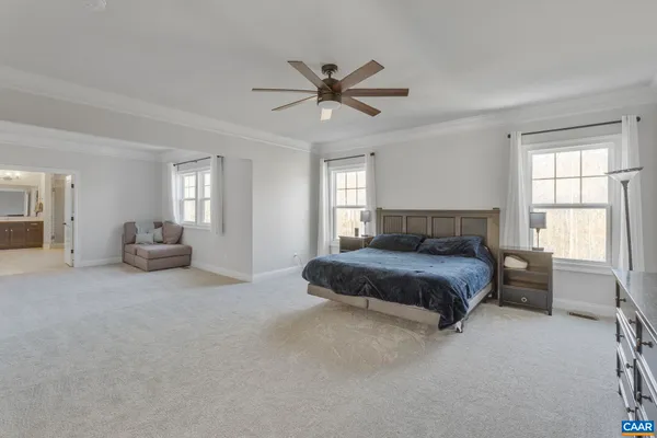 a bath room with a bath tub and a shower