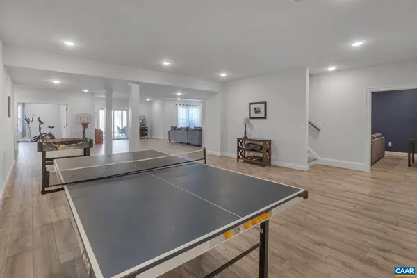 a view of a house with a yard and sitting area