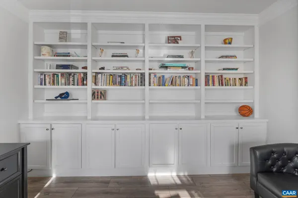 a view of a livingroom with shelves