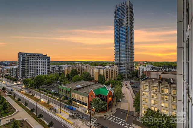 a view of a balcony with city view