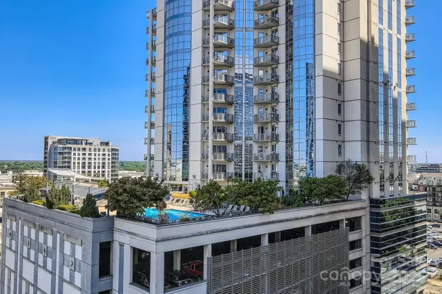 a view of a city with tall buildings