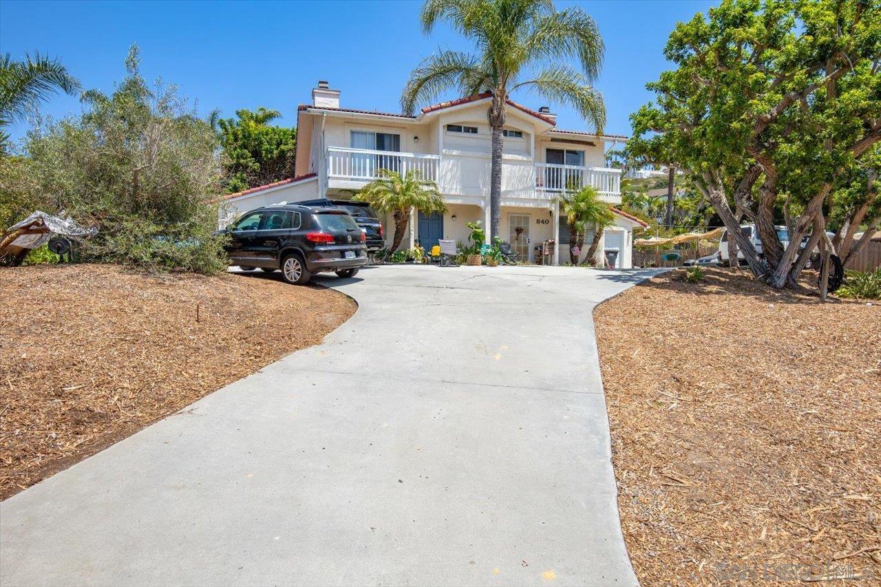 838 Valley Avenue Solana Beach, CA 92075 - Photo 3 of 16 a front view of a house with a yard