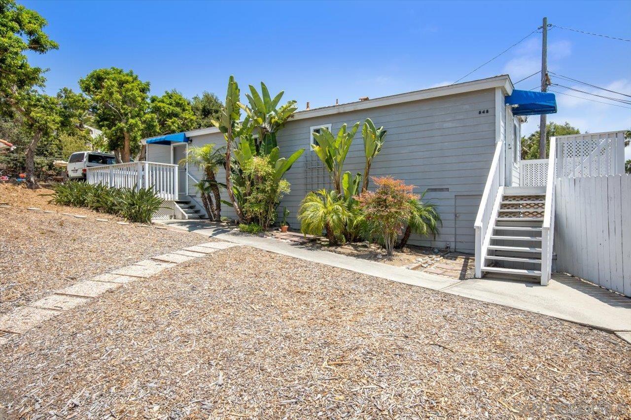 838 Valley Avenue Solana Beach, CA 92075 - Photo 5 of 16 a backyard of a house with flower plants