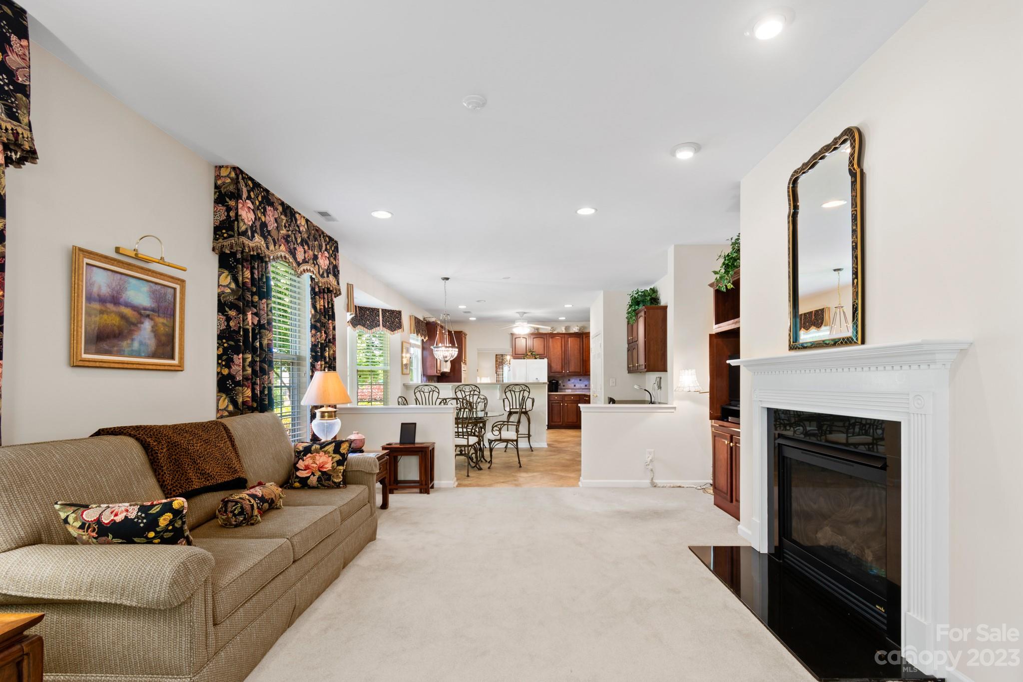 2308 Jade Lane Fort Mill, SC 29708 - Photo 21 of 48 a living room with furniture and a fireplace