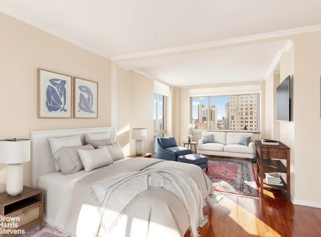 a living room with furniture and a window