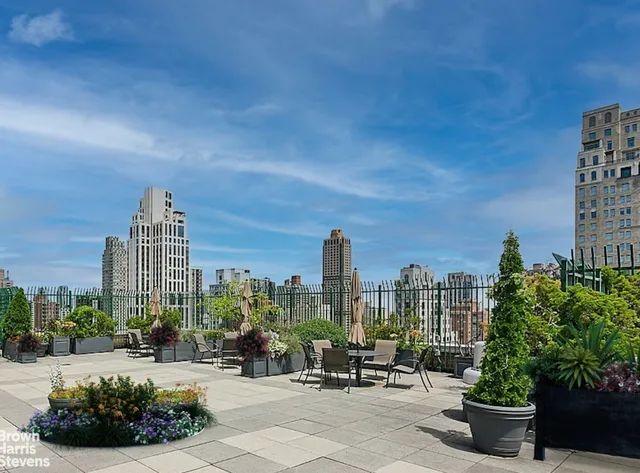 a bed room with a bed and a window