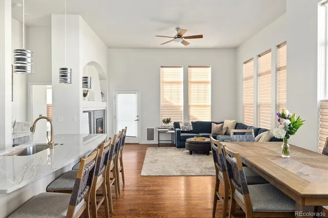 a view of a a dining room with furniture window and outside view