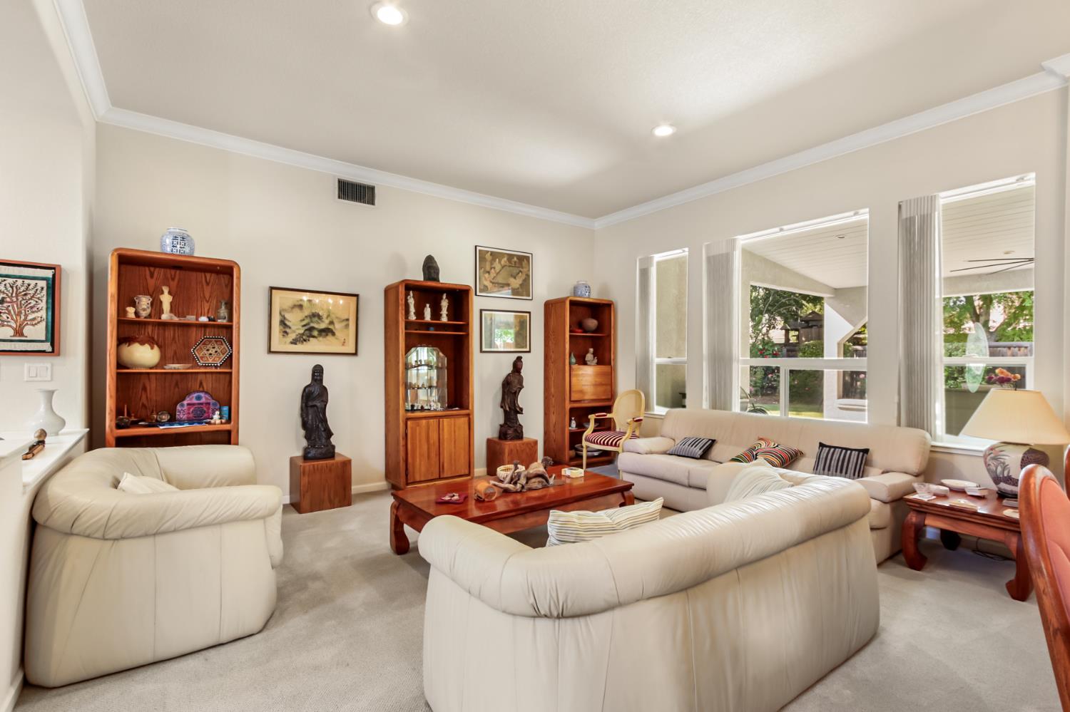 5415 Rogers Street Davis, CA 95618 - Photo 11 of 77 a living room with furniture and large windows
