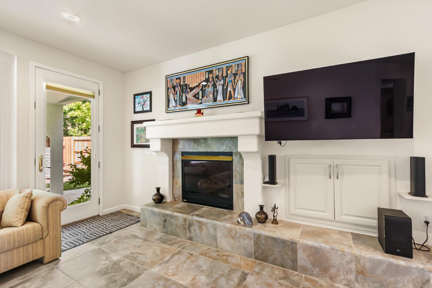 5415 Rogers Street Davis, CA 95618 - Photo 17 of 77 a living room with furniture and a fireplace