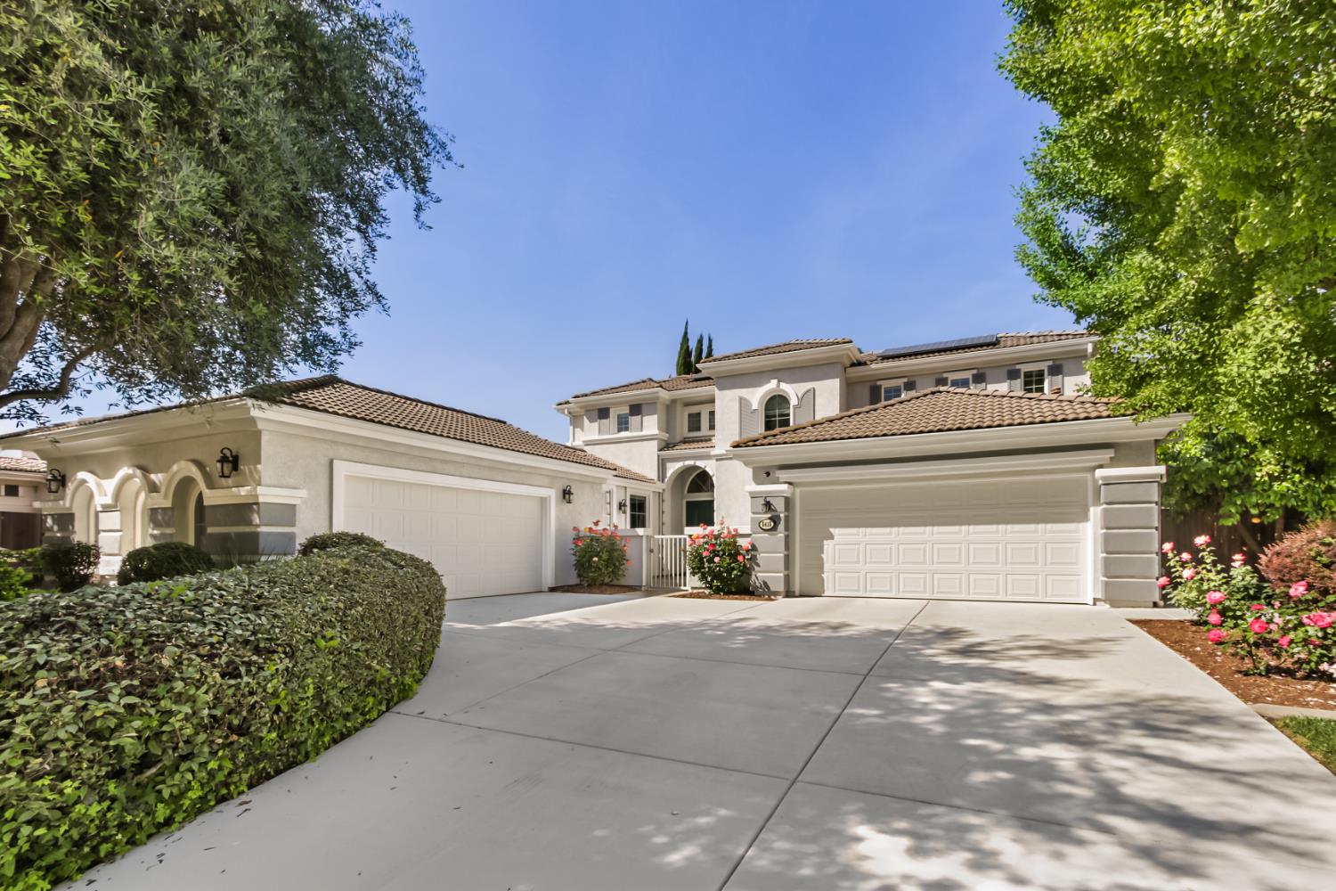 5415 Rogers Street Davis, CA 95618 - Photo 3 of 77 a front view of a house with a yard and garage