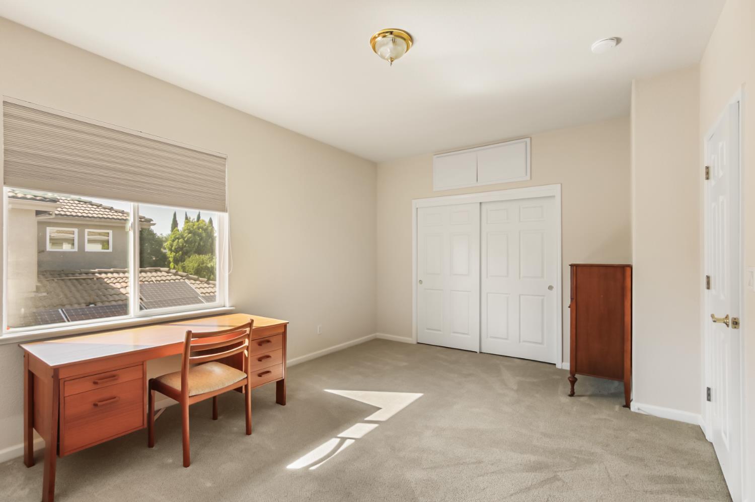 5415 Rogers Street Davis, CA 95618 - Photo 43 of 77 a room with a table and a window