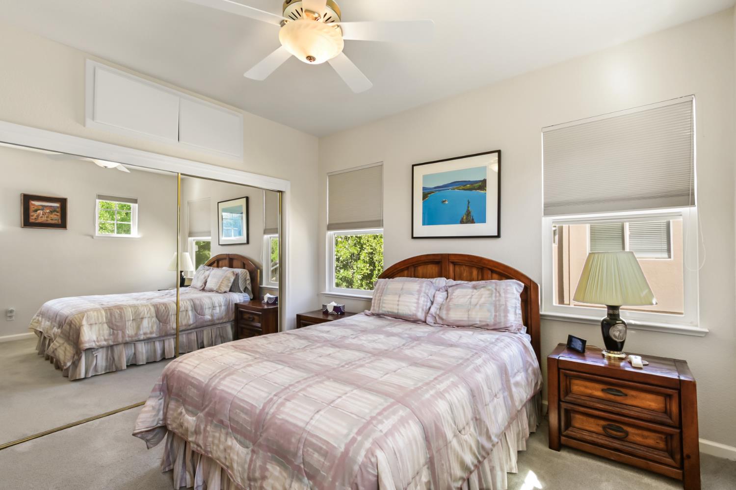 5415 Rogers Street Davis, CA 95618 - Photo 44 of 77 a bedroom with two beds and a chandelier