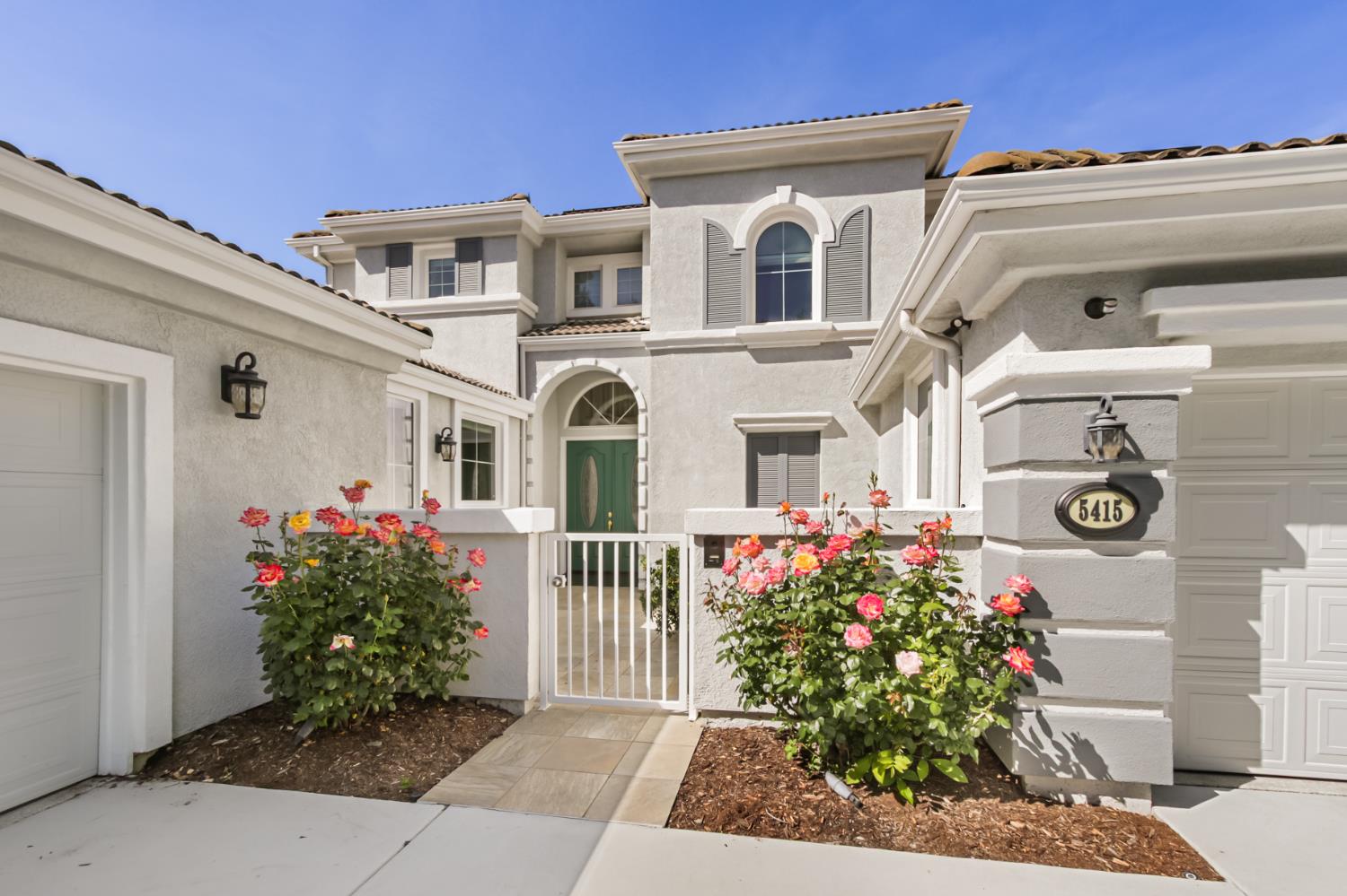5415 Rogers Street Davis, CA 95618 - Photo 5 of 77 a front view of a house with plants