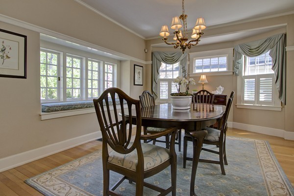 40 Glen Road Winchester, MA 01890 - Photo 11 of 30 a view of a dining room with furniture wooden floor and chandelier