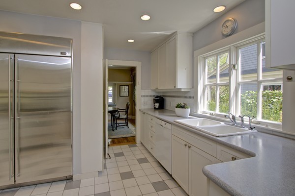 40 Glen Road Winchester, MA 01890 - Photo 14 of 30 a large kitchen with a window and stainless steel appliances