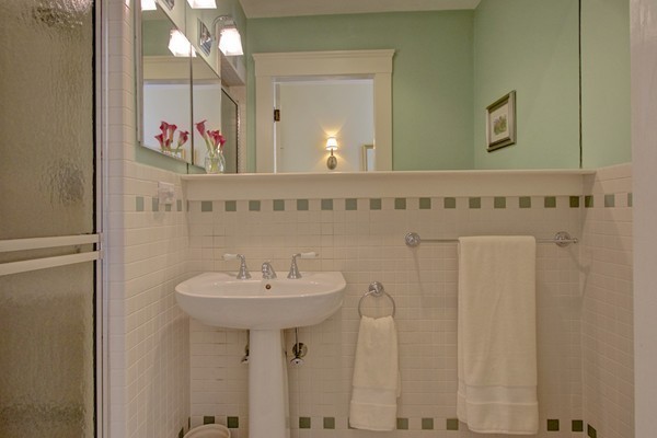 40 Glen Road Winchester, MA 01890 - Photo 18 of 30 a bathroom with a sink and a mirror