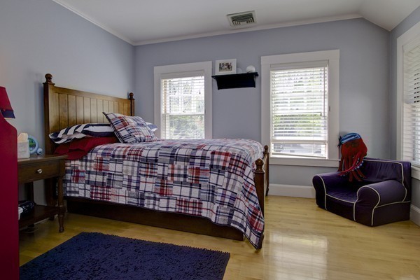 40 Glen Road Winchester, MA 01890 - Photo 22 of 30 a bedroom with a bed and window
