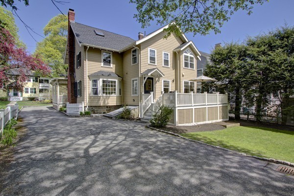 40 Glen Road Winchester, MA 01890 - Photo 29 of 30 a front view of a house with a yard and garage
