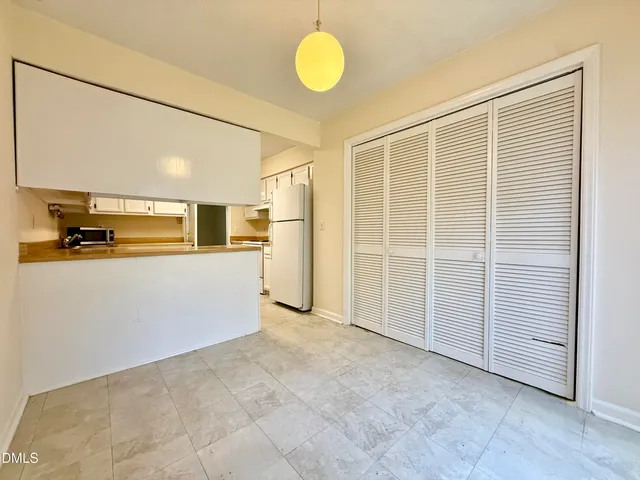 a view of a livingroom with wooden floor