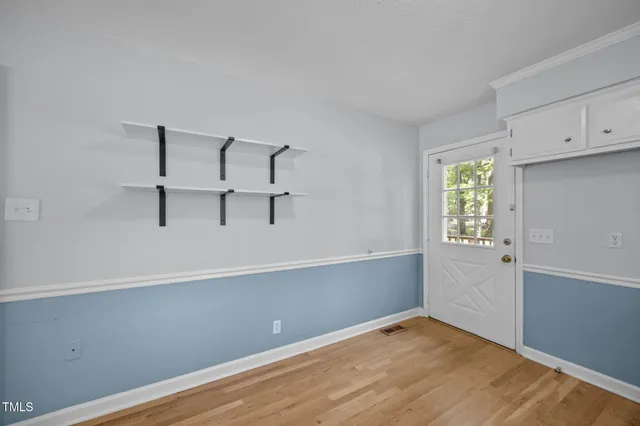 a view of an empty room with window