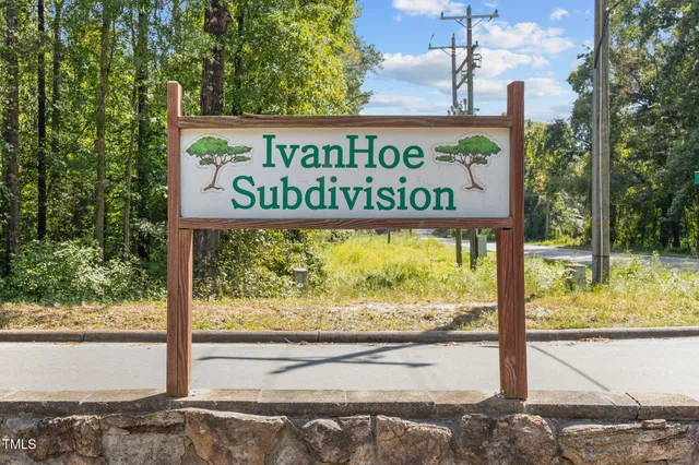 a sign on the side of a street