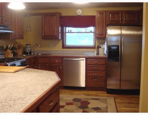 1718 Greentree Road Pittsburgh, PA 15220 - Photo 5 of 12 Kitchen. Updated kitchen, hard wood floors, granite counter top in wrok area and on island