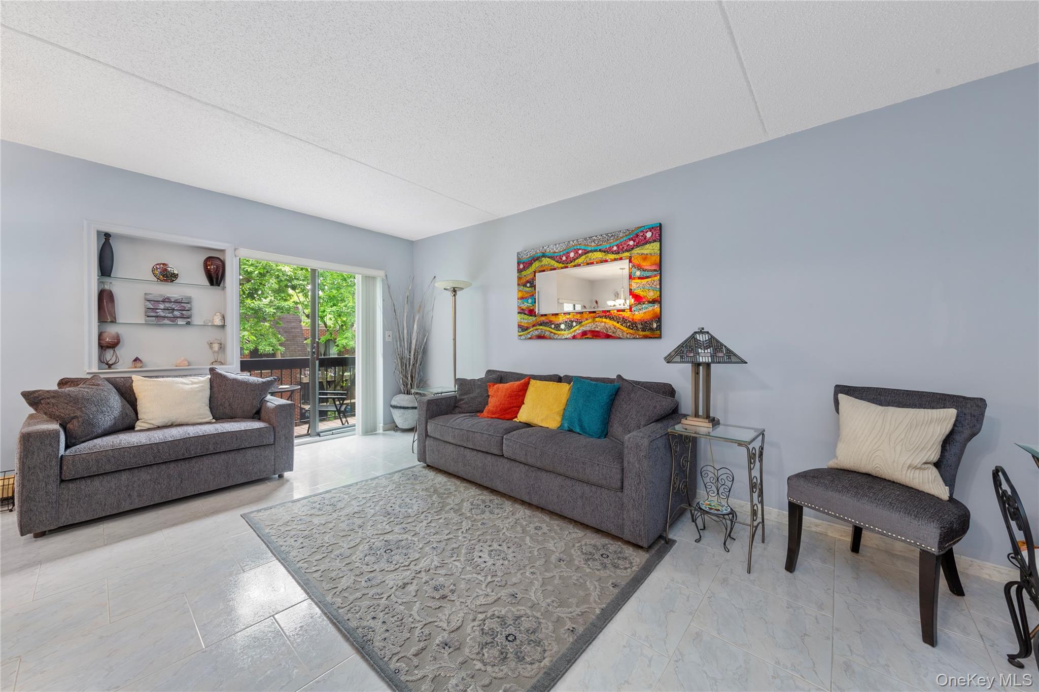 71-28 Sutton Place, Unit 3 Queens, NY 11365 - Photo 4 of 23 Living room with a textured ceiling
