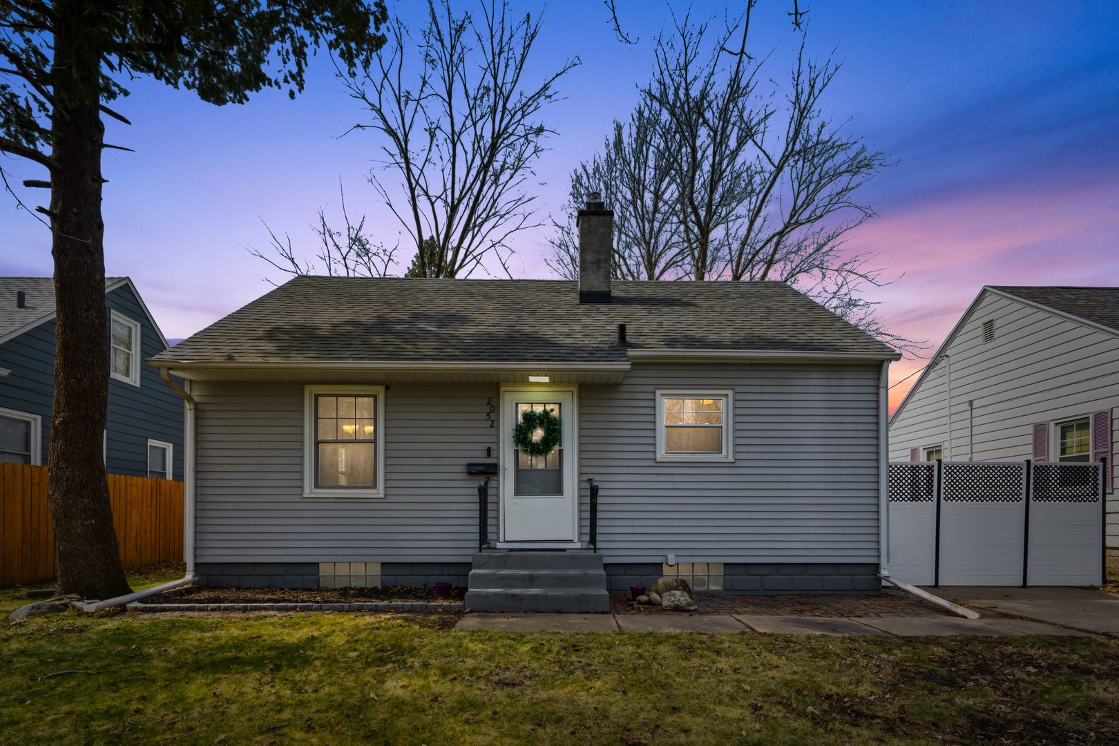 2052 37th Street Rock Island, IL 61201 - Photo 1 of 28 a view of a house with a yard