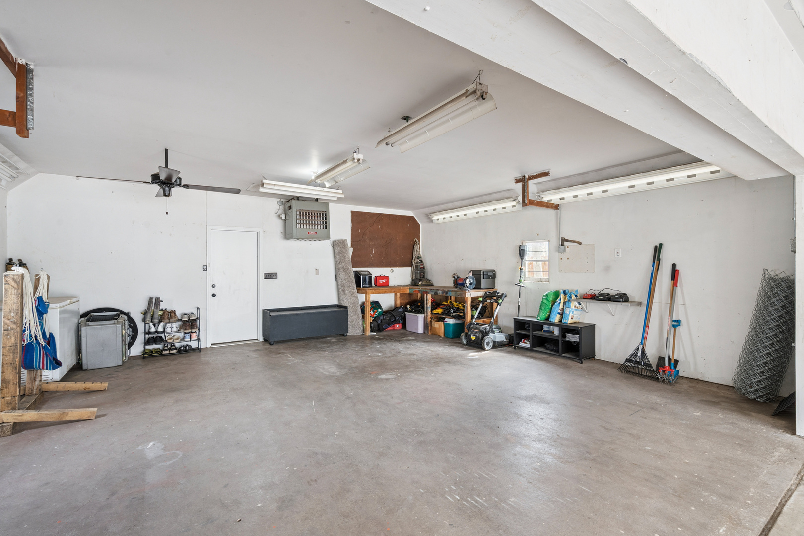 2052 37th Street Rock Island, IL 61201 - Photo 18 of 28 a view of a garage with a bike and car