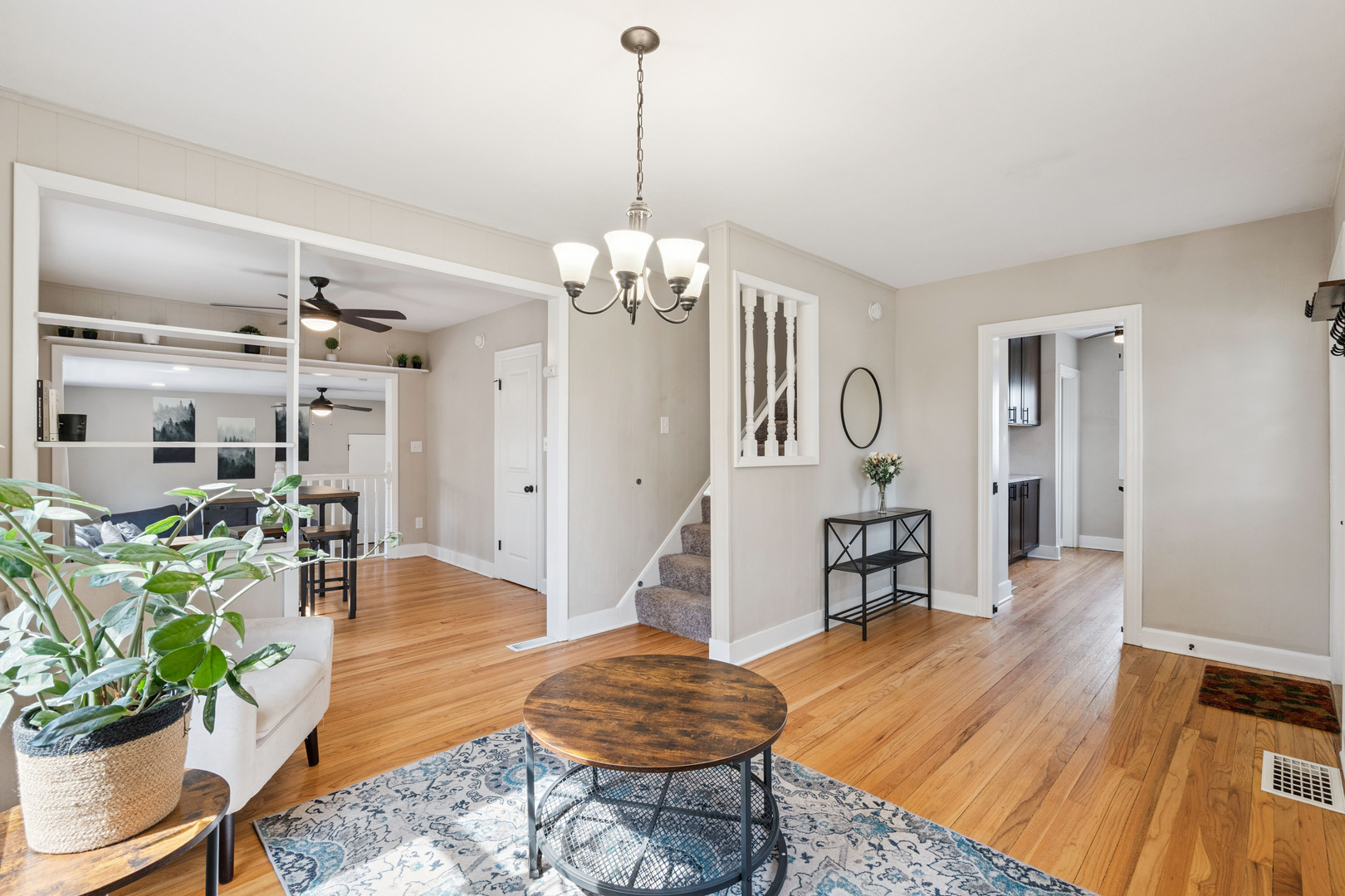 2052 37th Street Rock Island, IL 61201 - Photo 4 of 28 a living room with dining table and wooden floor