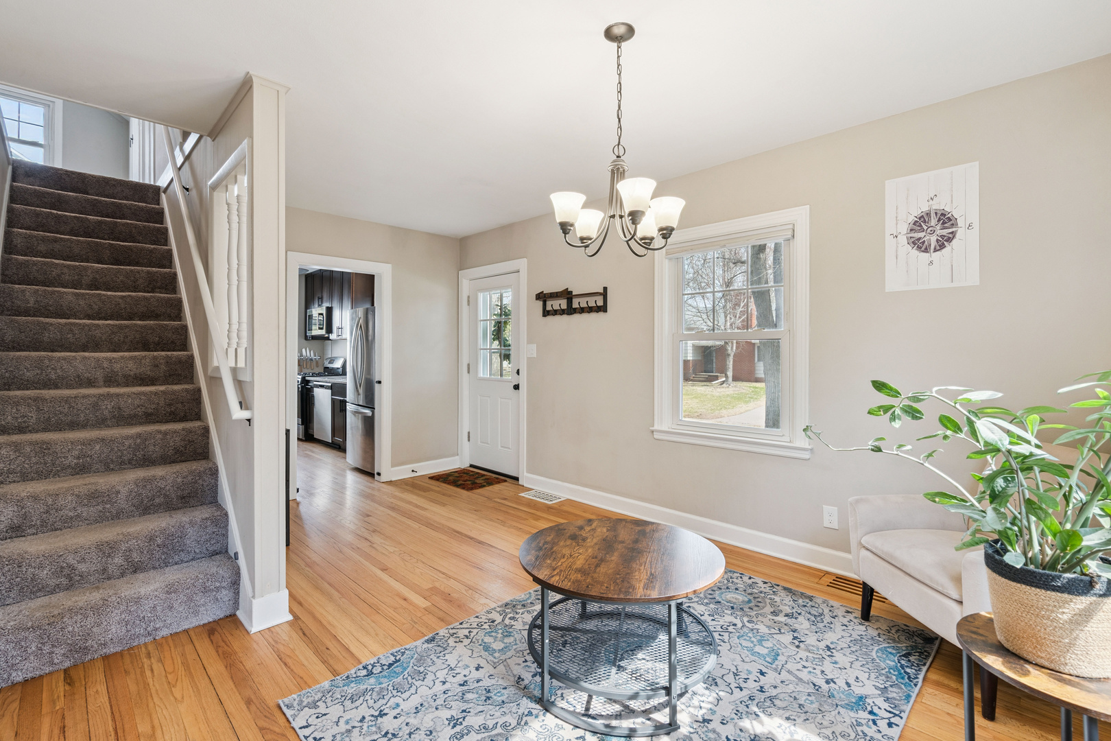2052 37th Street Rock Island, IL 61201 - Photo 5 of 28 a view of a livingroom with furniture and wooden floor