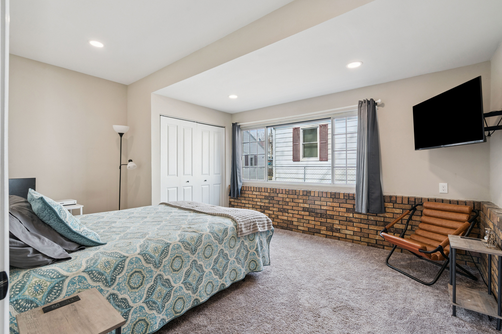 2052 37th Street Rock Island, IL 61201 - Photo 10 of 28 a bedroom with a bed and flat screen tv