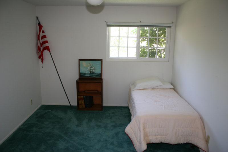 3886 Calle Cita Santa Barbara, CA 93110 - Photo 13 of 14 a room with a chair and white walls