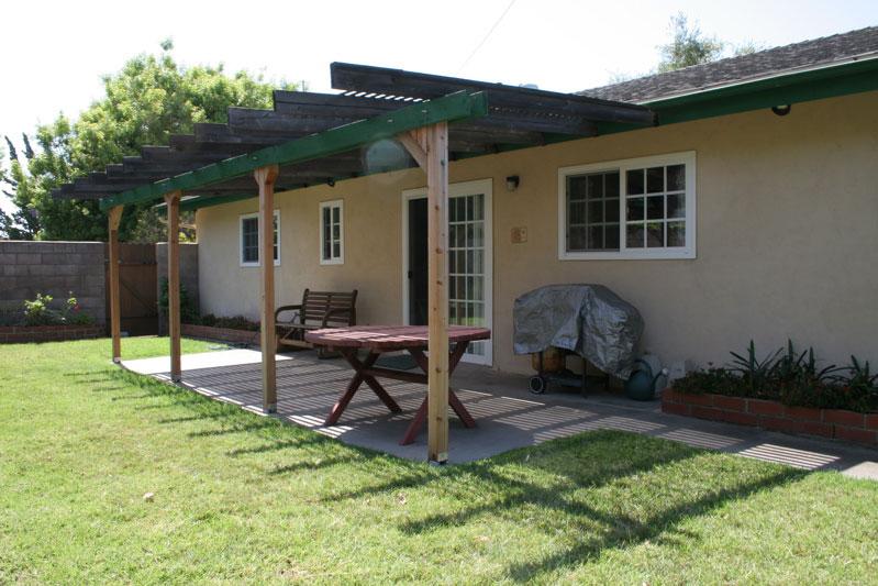 3886 Calle Cita Santa Barbara, CA 93110 - Photo 14 of 14 a backyard of a house with table and chairs
