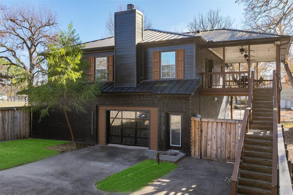 106 White Oak Mabank, TX 75156 - Photo 28 of 32 a front view of a house with a yard