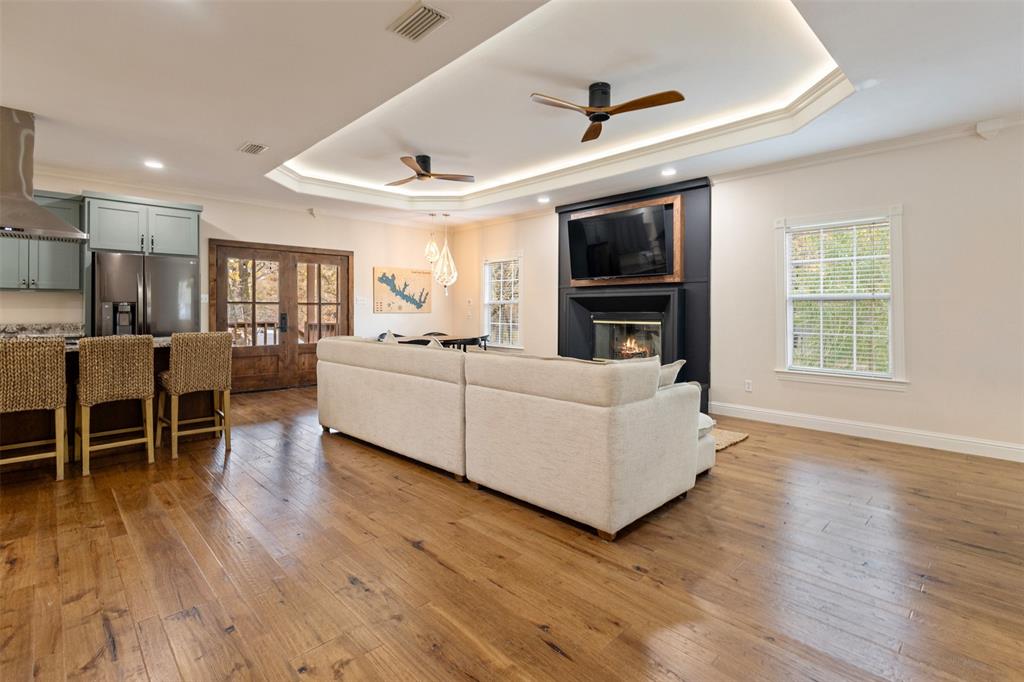 106 White Oak Mabank, TX 75156 - Photo 5 of 32 a living room with furniture and a flat screen tv