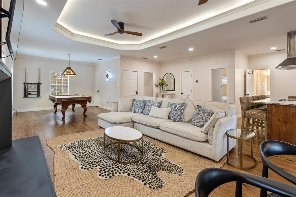 106 White Oak Mabank, TX 75156 - Photo 8 of 32 a living room with furniture and a wooden floor