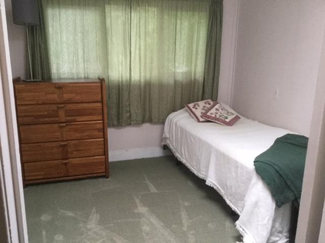 135 Shadowbrook Road Ben Lomond, CA 95005 - Photo 13 of 21 a bedroom with a bed and a dresser