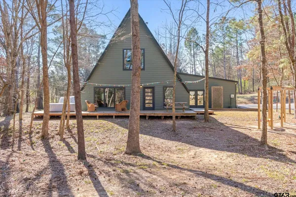a view of a house with snow on the ground