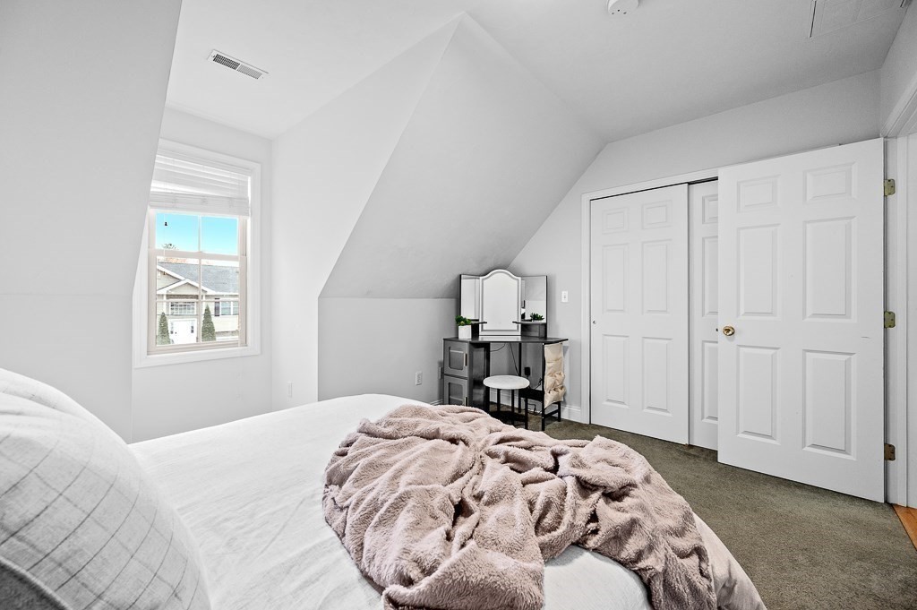 3 Carter Way Worcester, MA 01609 - Photo 21 of 41 a bedroom with a bed and a closet